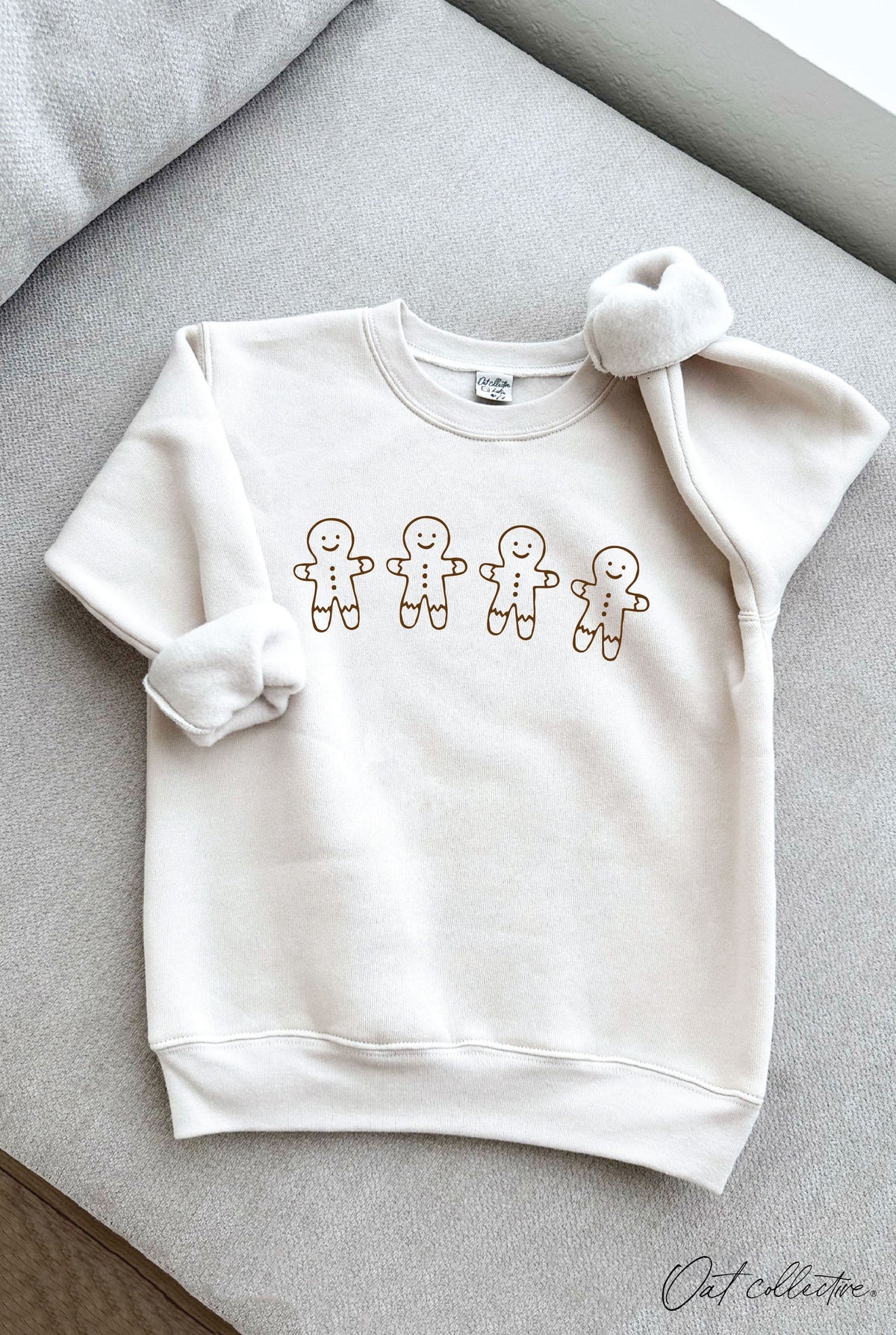 GINGERBREAD ROW Youth Unisex Graphic Sweatshirt Oat Collective