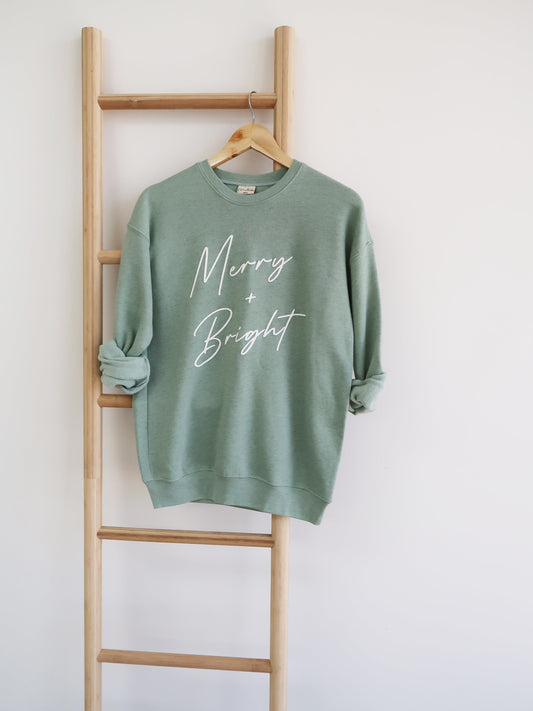 MERRY AND BRIGHT PUFF Graphic Sweatshirt Oat Collective
