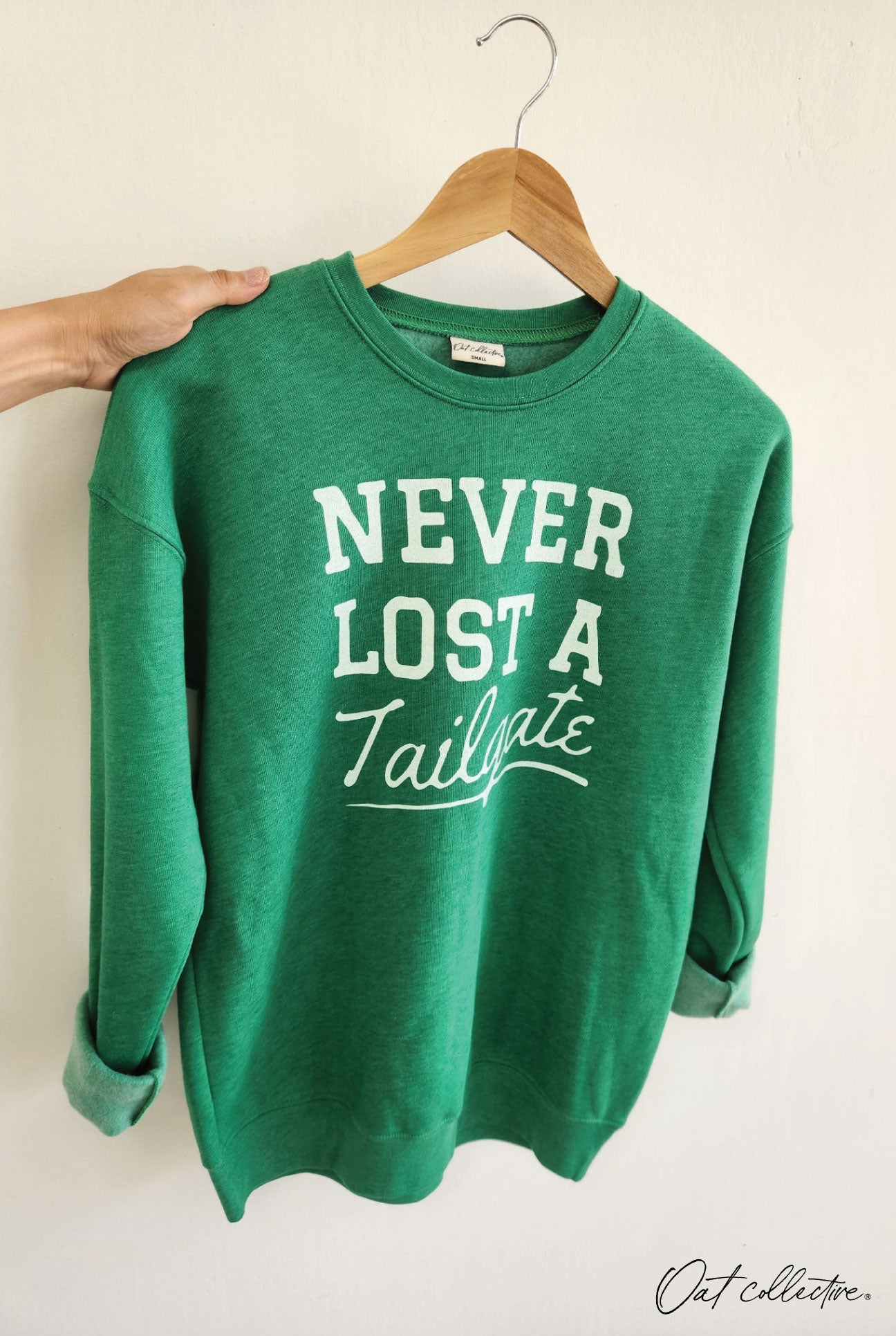 NEVER LOST A TAILGATE Graphic Sweatshirt Oat Collective