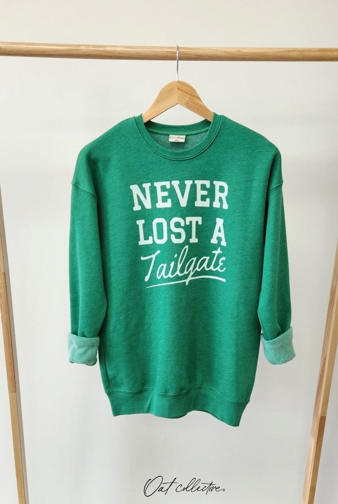 NEVER LOST A TAILGATE Graphic Sweatshirt Oat Collective