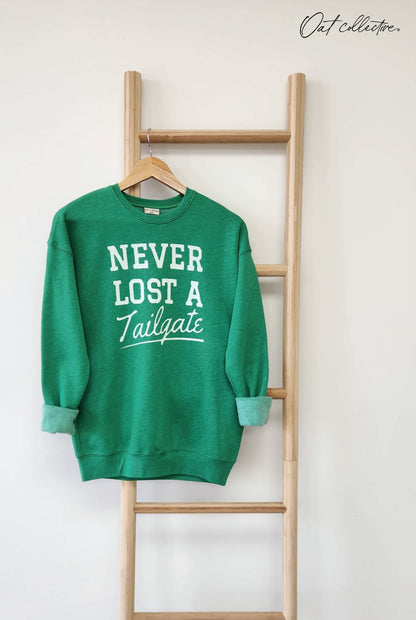 NEVER LOST A TAILGATE Graphic Sweatshirt Oat Collective